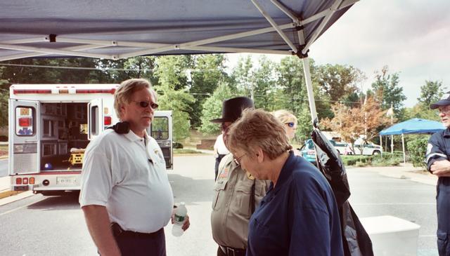 Lynn, Howard, and Nora under the tent.