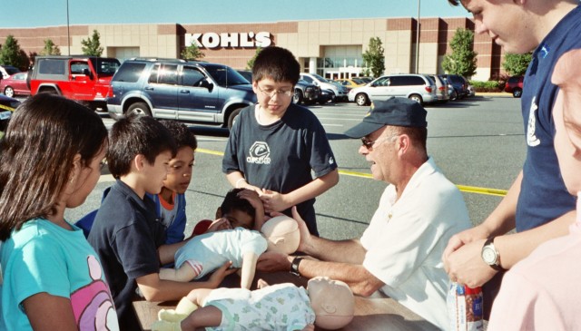 Mike Toellner demonstrates how to help a choking baby