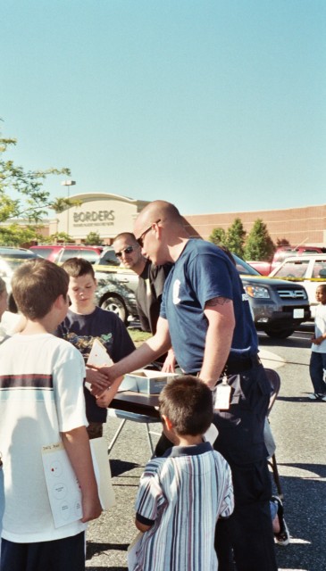 Ben Hogan teaches the children about the Rules of the Road for bike safety