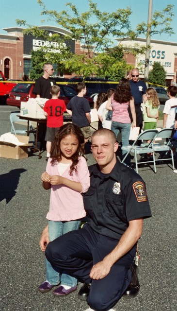 Firefighter Recruit/EMT Jason Herman poses with future EMT