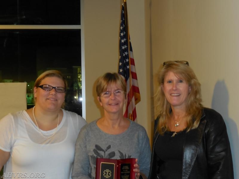 President Angela Wilhelm, Rescue Chief Jayne Toellner, outgoing Rescue Chief Patricia Copeland. Memorial presentation for Life Member Mike Toellner