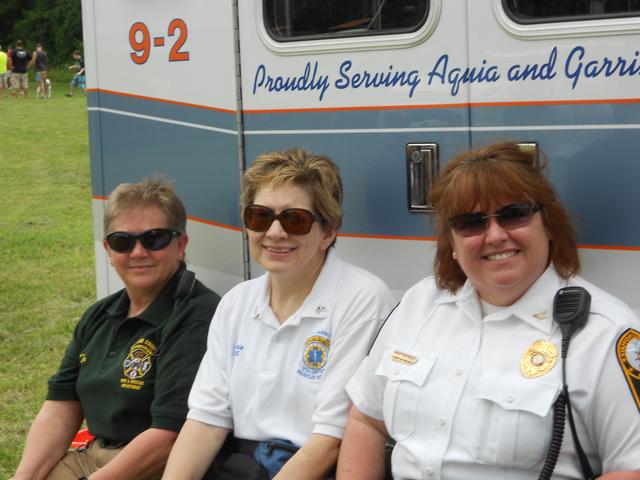 Tina Talley, Chris Schoon, and Chief Harmon
4th of July Picnic Lions' Field Aquia Harbour