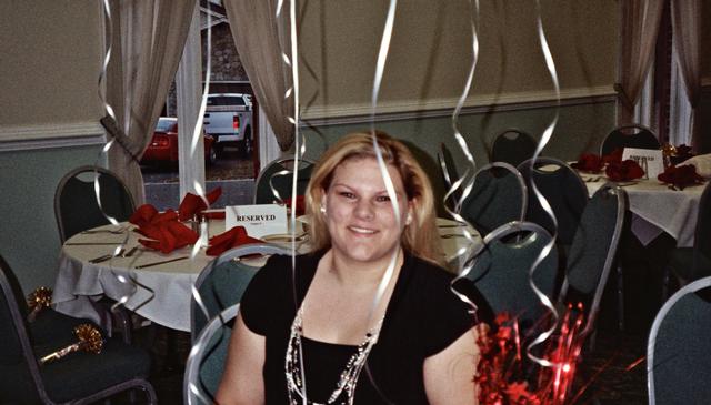 Angela Wilhelm setting up for Banquet 2009