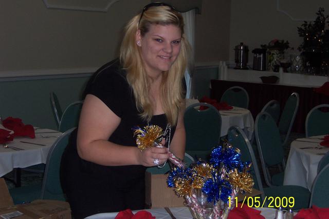 Angela setting  arranging the centerpieces
Banquet Nov. 7, 2009