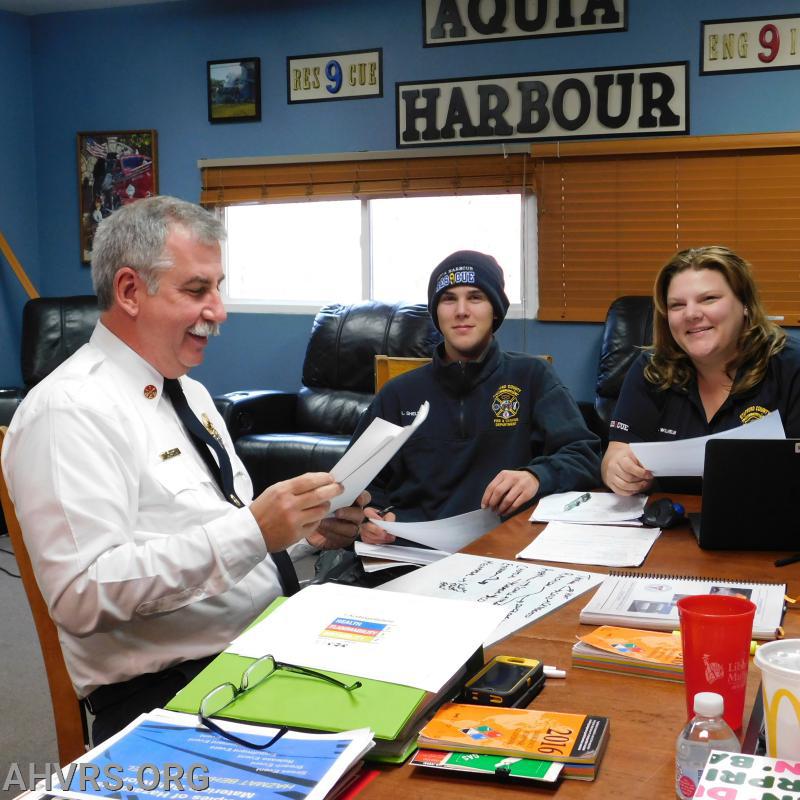 Chief Dunn reviewing with Luke an d Angela